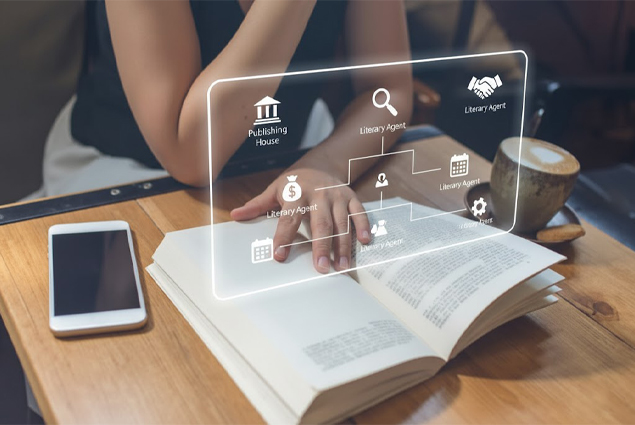 Person reading a book at a desk